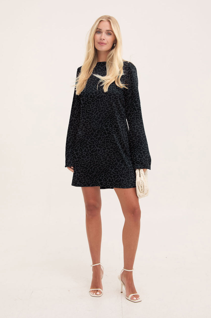 Woman wearing animal dress on white background